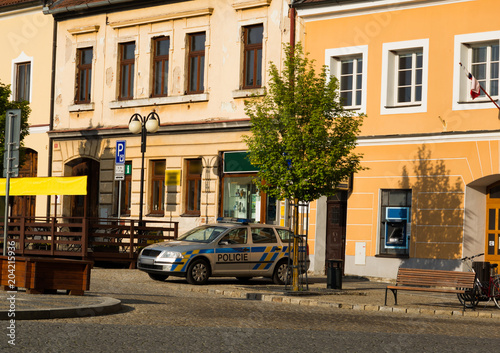 Police car in center of Bechyne city, South Bohemia, Czech Republic.