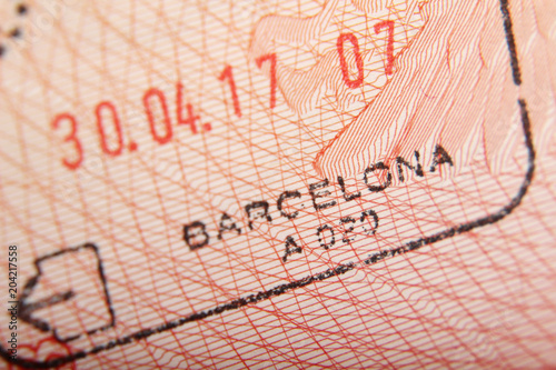 Departure stamp in a passport from Barcelona airport