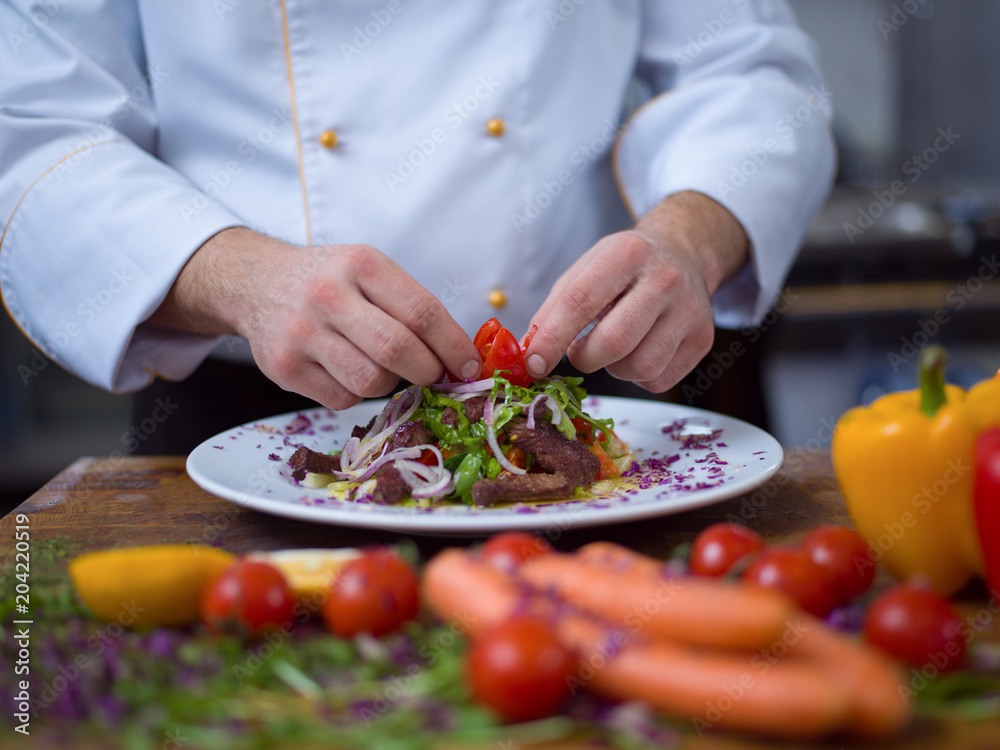 cook chef decorating garnishing prepared meal