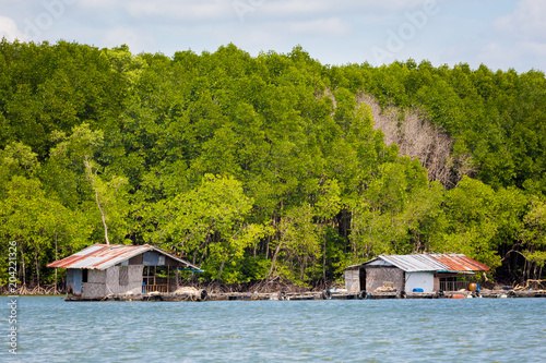 Huts on Pak Nam river © sitriel