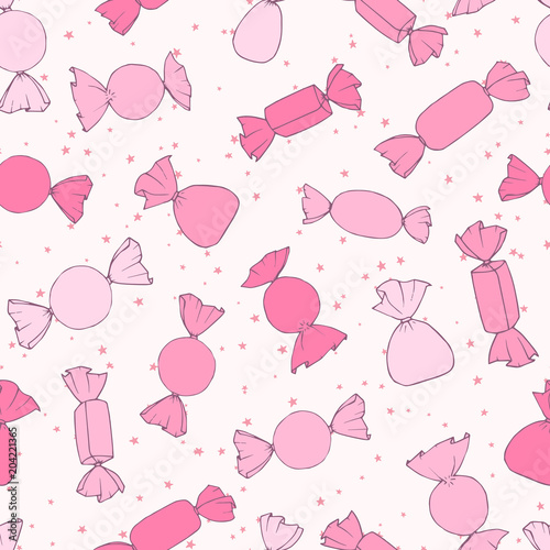 Hand drawn pink vector candies seamless pattern on the starry background. Cute holiday decoration in pastel colors.
