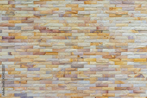 Backdrop of marble stone brick wall texture.
