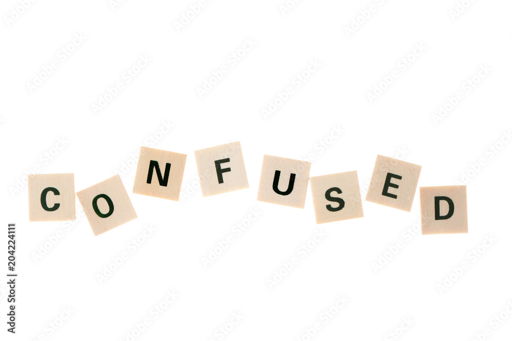 word confused written with wooden blocks with clipping path. word confused written with wooden blocks with clipping path.
