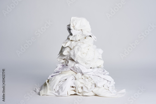Foto Laundry heap on the grey background