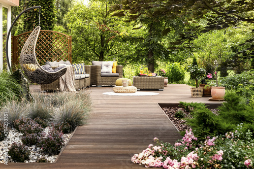 Fotografia, Obraz Wooden terrace surrounded by greenery