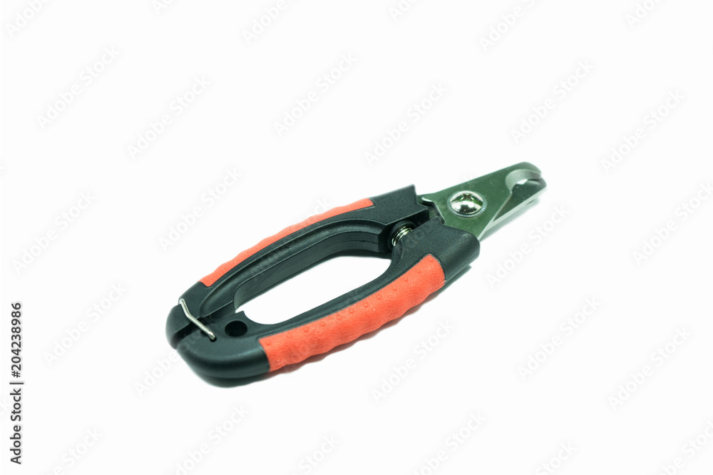 Fototapeta premium Pet supplies about nails scissors on isolated white background.
