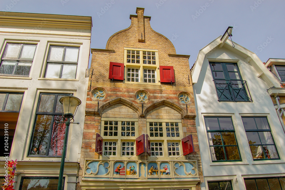 Obraz premium Three monumental buildings with typical Dutch facades. Gouda Netherlands.