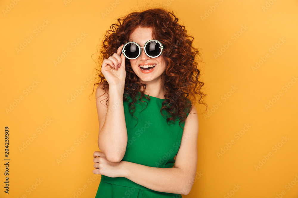 Portrait of a happy redhead woman in dress Portrait of a happy redhead woman in dress