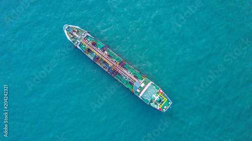 Aerial top view tanker ship, oil tanker, gas tanker, import export business logistic and transportation. © Kalyakan