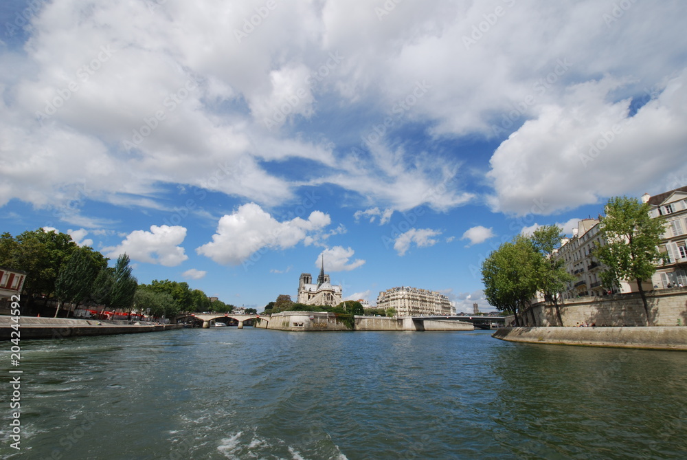 Notre Dame de Paris; sky; waterway; cloud; water Notre Dame de Paris; sky; waterway; cloud; water