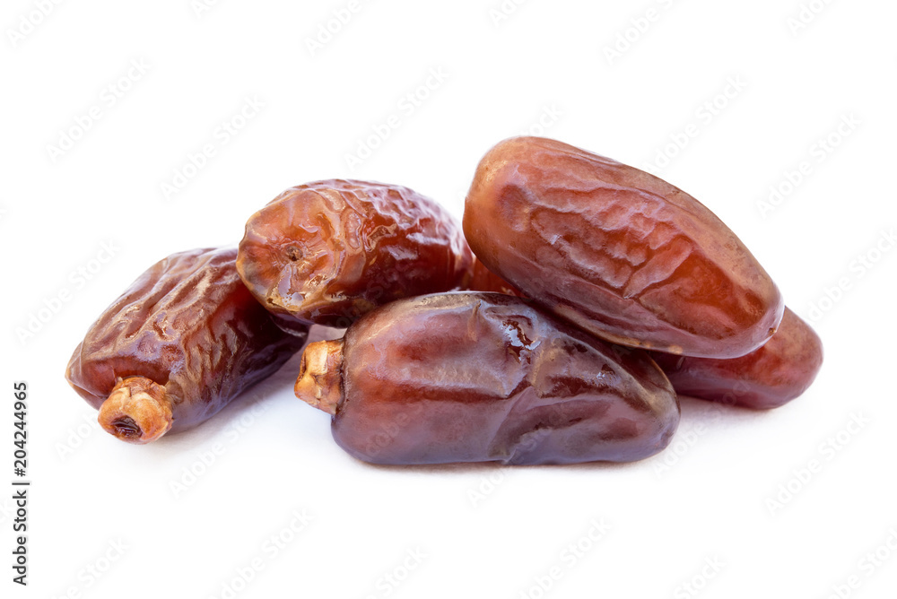 Dried sweet dates isolated on a white background Dried sweet dates isolated on a white background