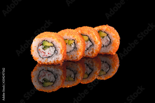 sushi rolls isolated on the black background