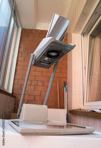 Overhead Projector for presentation at home on balcony photo