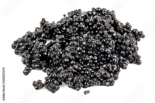 heap of black caviar on white