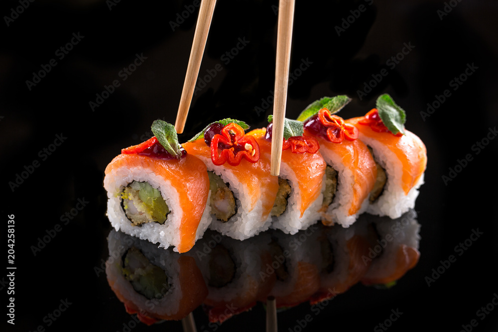 sushi set isolated on the black background