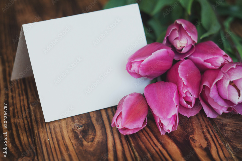 background greeting card with pink tulips