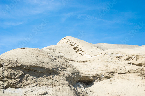 Rocky formation of sand and clay due to weathering