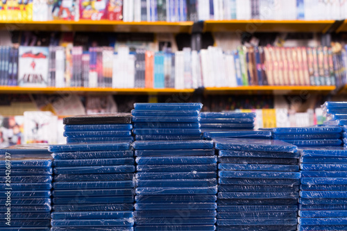 Stacks of new DVDs in store photo