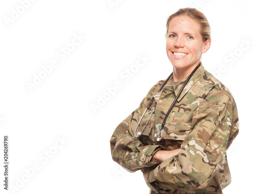 Female Army doctor in uniform with copy space.
