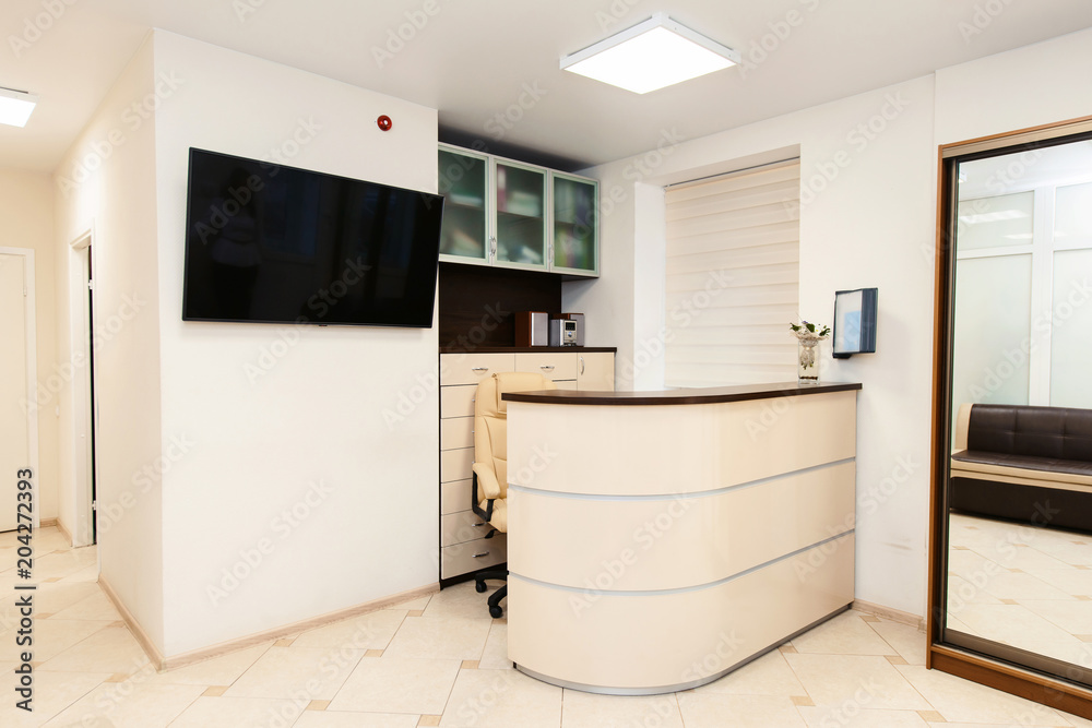 Wide shot interior of modern dental clinic with reception desk Stock Photo  | Adobe Stock