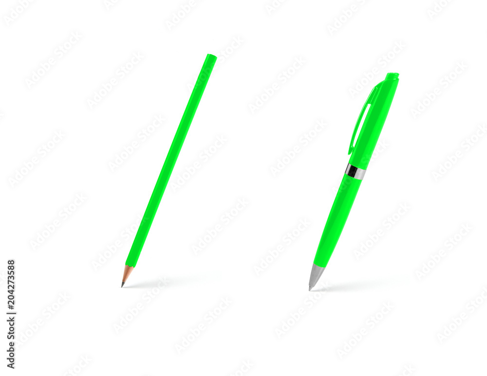 Green plastic ballpoint pen and pencil on a white background. Green plastic ballpoint pen and pencil on a white background.