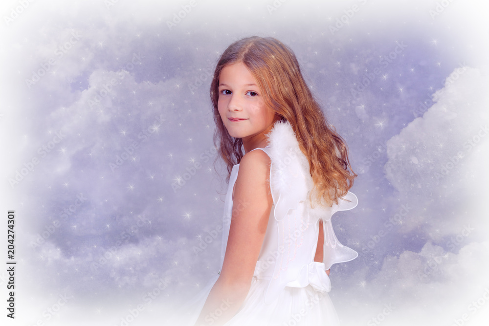 Young girl disguised as Christmas Angel Young girl disguised as Christmas Angel