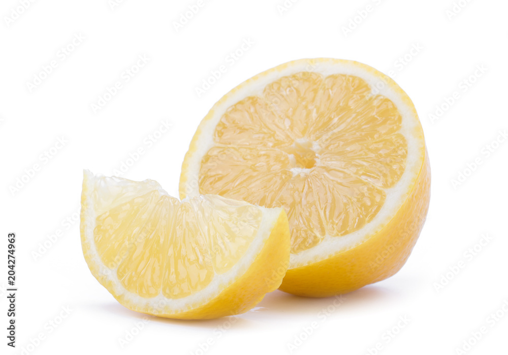 Ripe slice of yellow lemon citrus fruit isolated on white background with clipping path