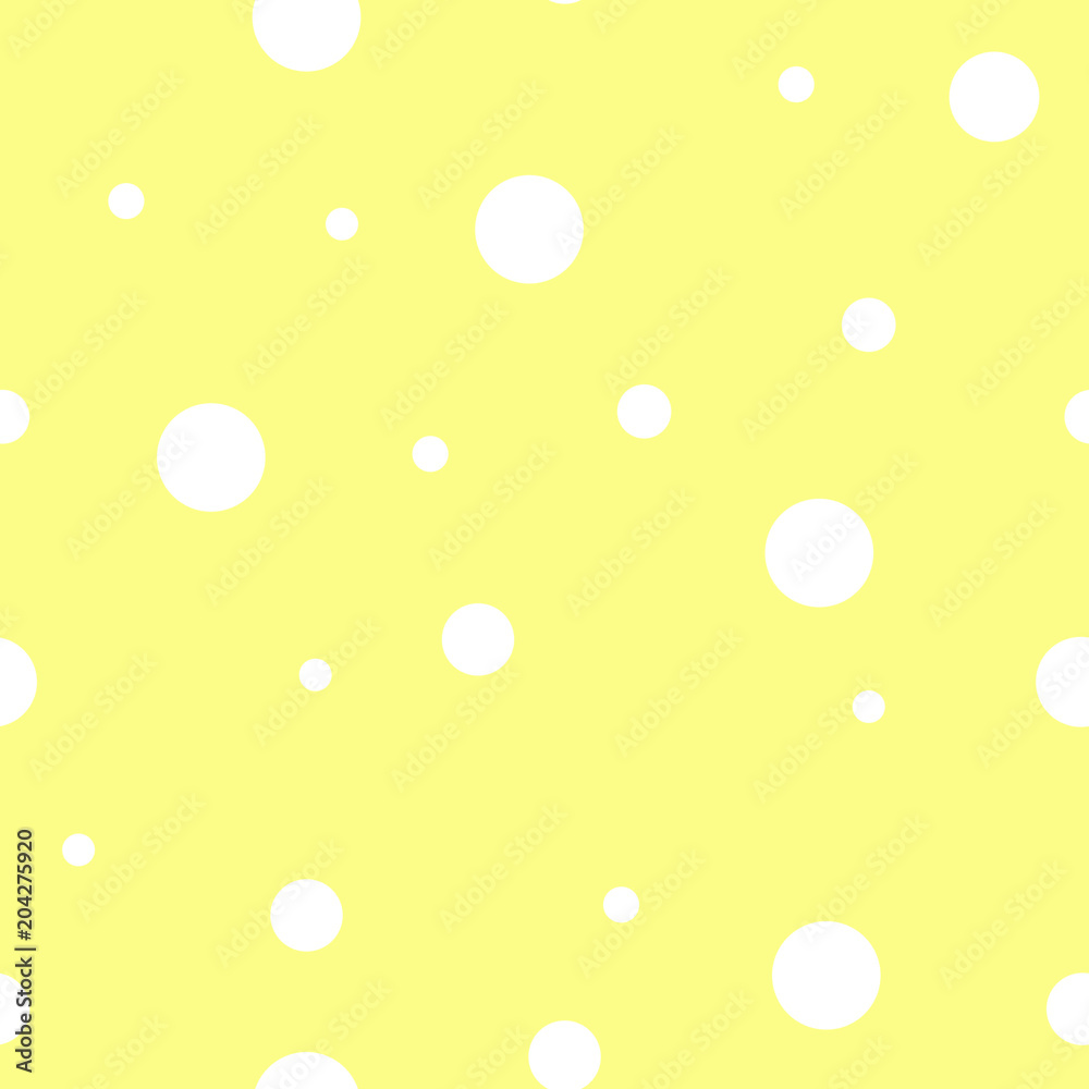 Seamless pattern. White polka dot on the yellow background
