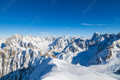 Picturesque view snowy mountain peaks panorama, Mont Blanc, Chamonix, Upper Savoy Alps, France © umike_foto
