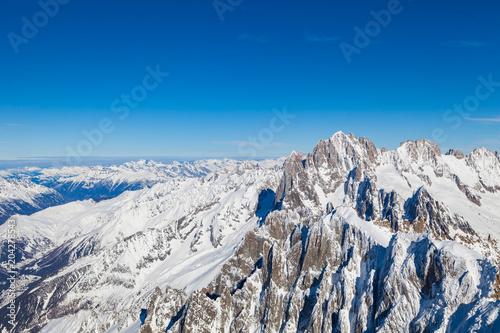 Picturesque view snowy mountain peaks panorama, Mont Blanc, Chamonix, Upper Savoy Alps, France photo