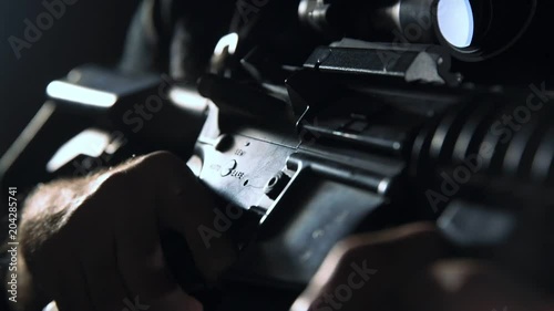 Spec ops police officer SWAT in black uniform studio