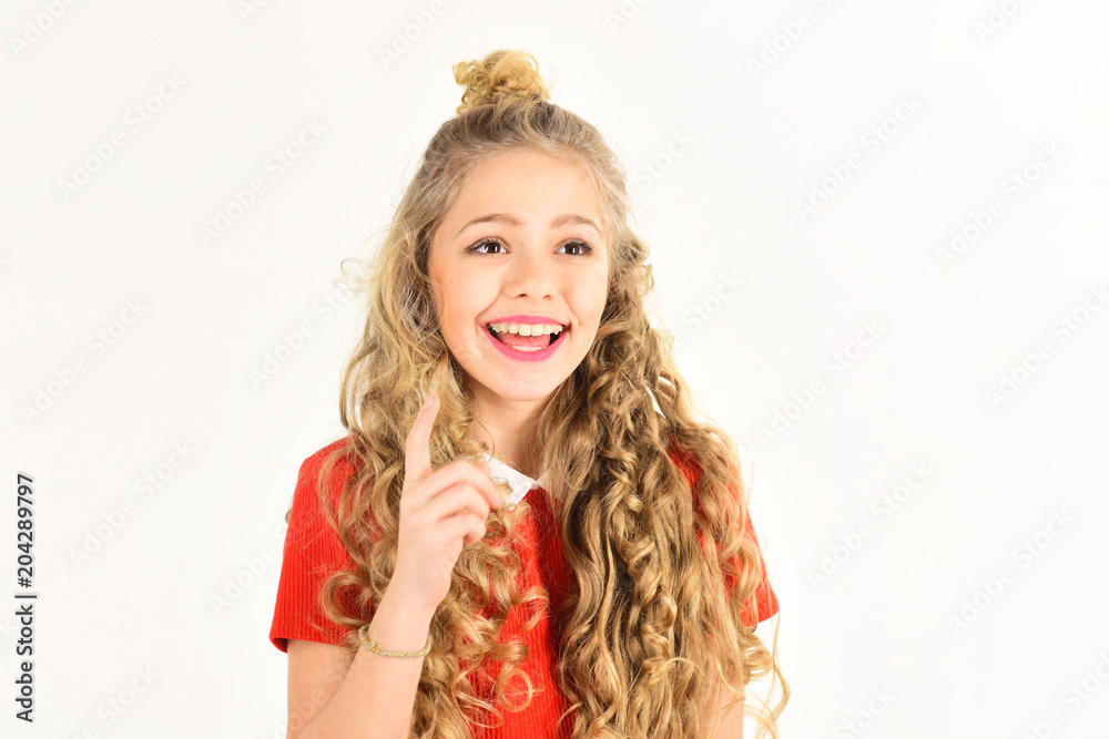 Portrait of beautiful smiling little girl with curly hair close up, isolated on white background, copy space Portrait of beautiful smiling little girl with curly hair close up, isolated on white background, copy space