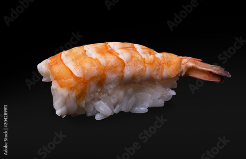 One sushi with shrimp on a black background