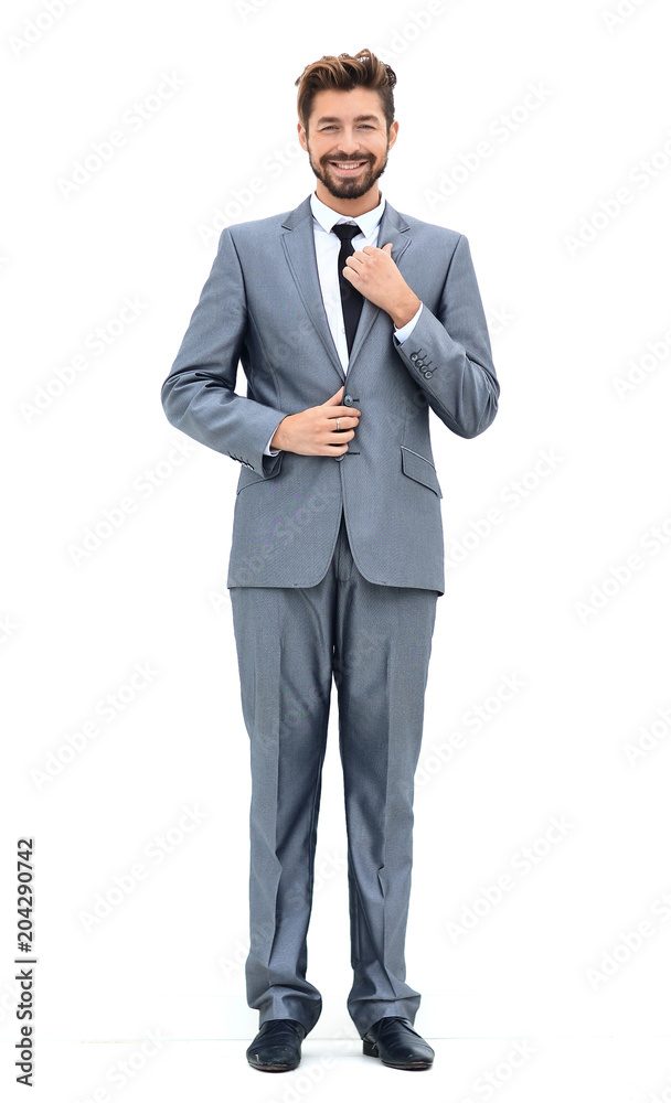 Man in suit straightens collar, portrait on white background Man in suit straightens collar, portrait on white background