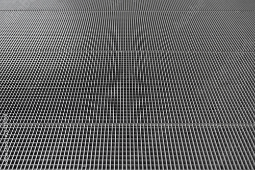 Grey iron lattice floor background for your design. photo