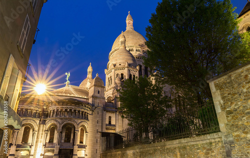 The basilica Sacre Coeur at night , Paris, France.
