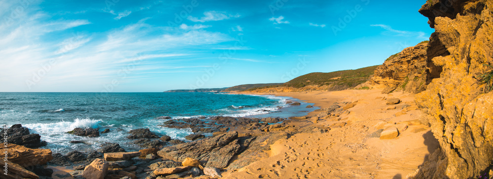 Landscape on the beach of Gutturu and Flumini with rocks and waves Landscape on the beach of Gutturu and Flumini with rocks and waves