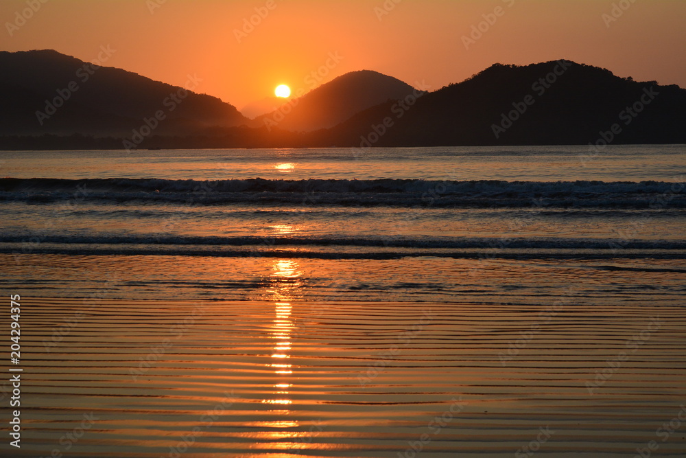 Sunset in Pereque beach, Ubatuba, Brazi