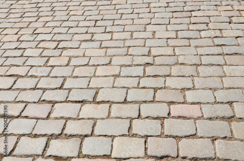 background road pavement of old bricks