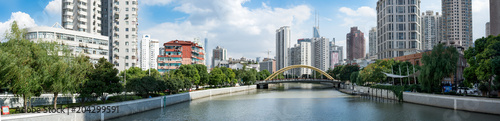 Wuzhen Road Bridge over Suzhou Creek, Shanghai, China. Jing'an districts on the left and Huangpu on the right.