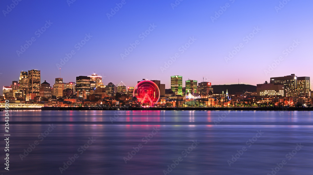 Montreal skyline and Saint Lawrence River at dusk, Quebec, Canada