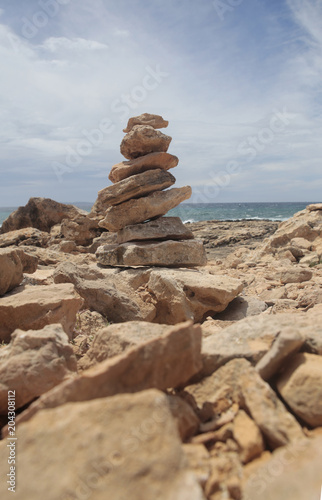 Stone balancing in the south coast of the Spanish island of Mallorca.