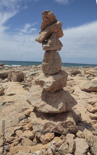 Stone balancing in the south coast of the Spanish island of Mallorca.