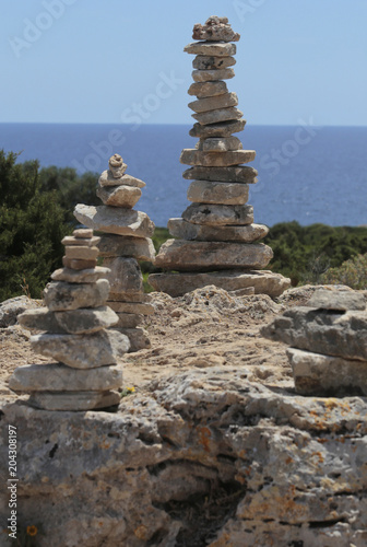 Stone balancing in the south coast of the Spanish island of Mallorca.