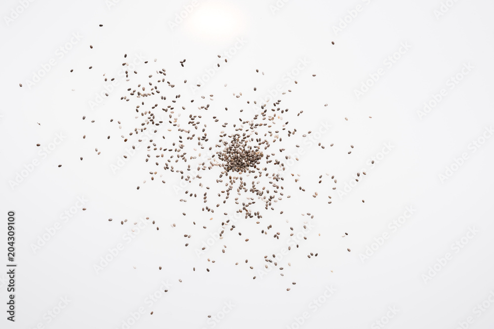 Chia seeds isolated with white background. Healthy superfood. Chia seeds isolated with white background. Healthy superfood.