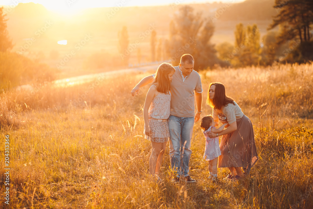 family in a field family in a field