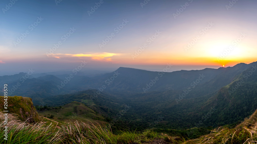 panoramic landscape beautiful mountain on sunset background and nature mist on forest , panorama Thailand