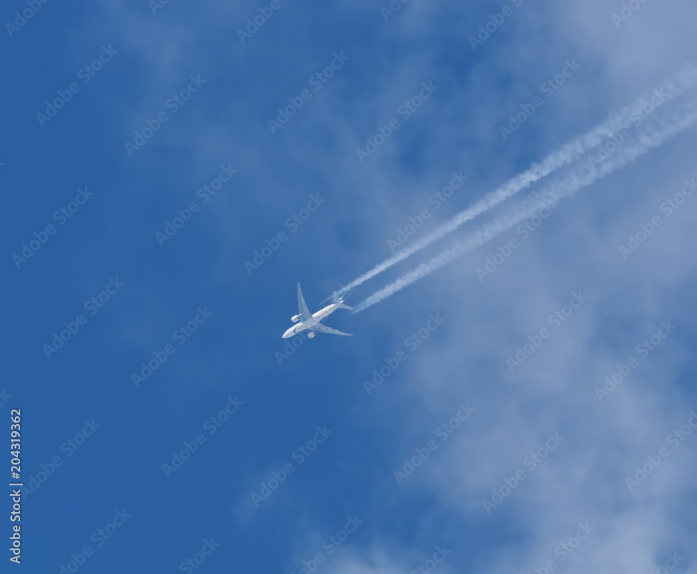 airplane against the blue sky airplane against the blue sky