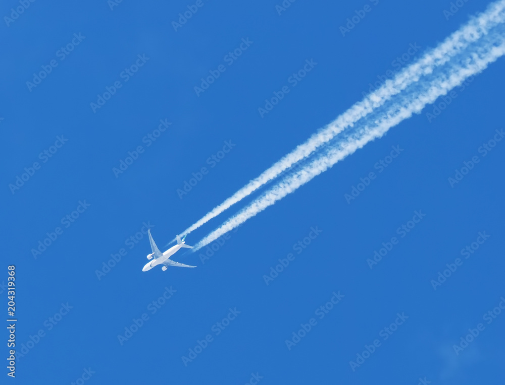 airplane against the blue sky airplane against the blue sky