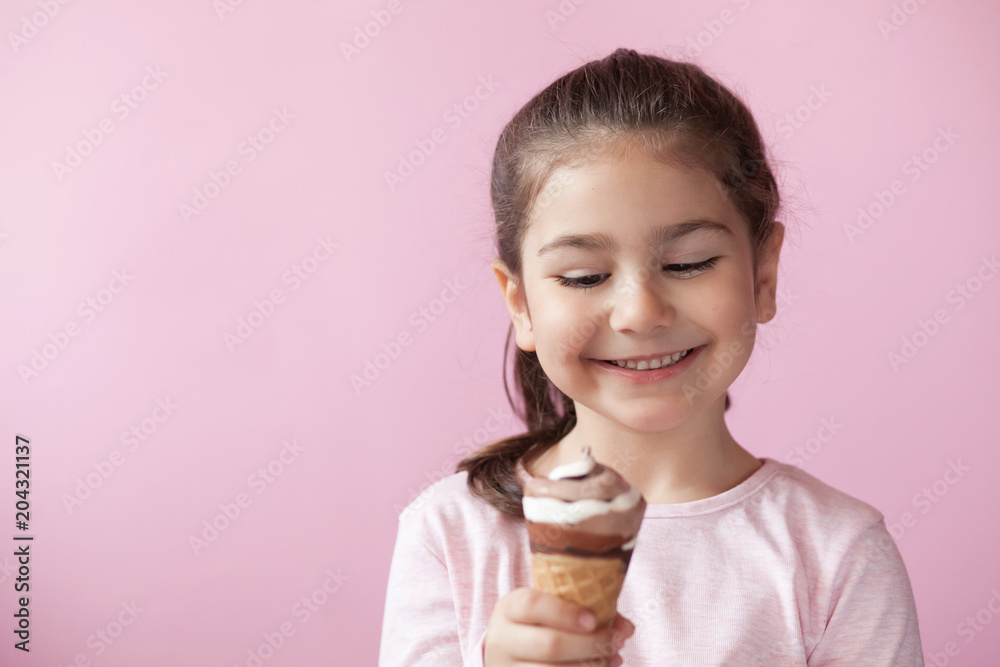 happy little girl with ice cream on a pastel background happy little girl with ice cream on a pastel background